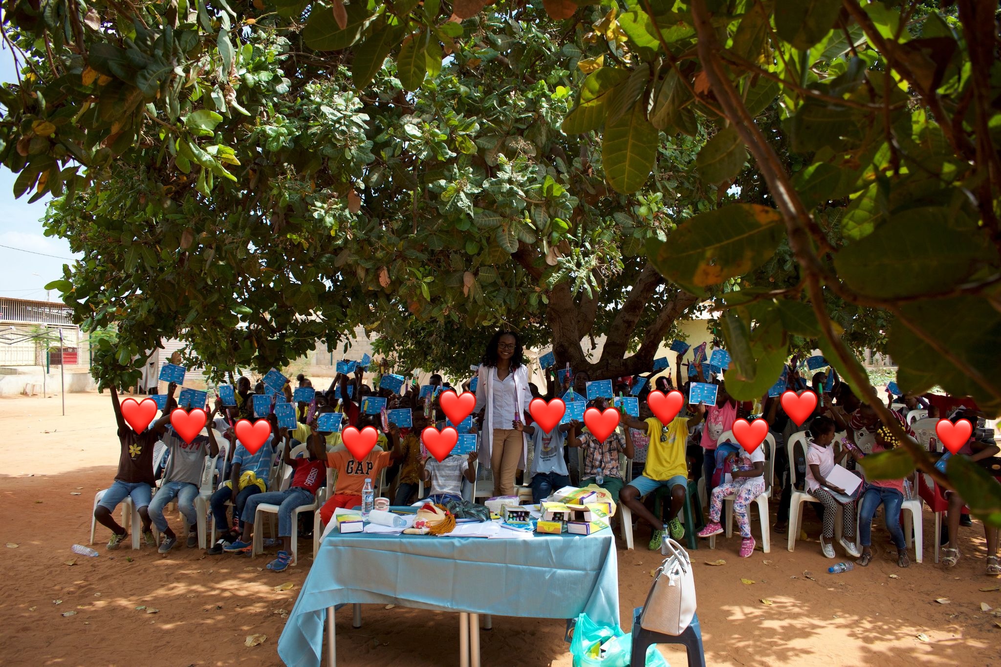 Standing with the children of the Symphonic Orchestra of Luanda